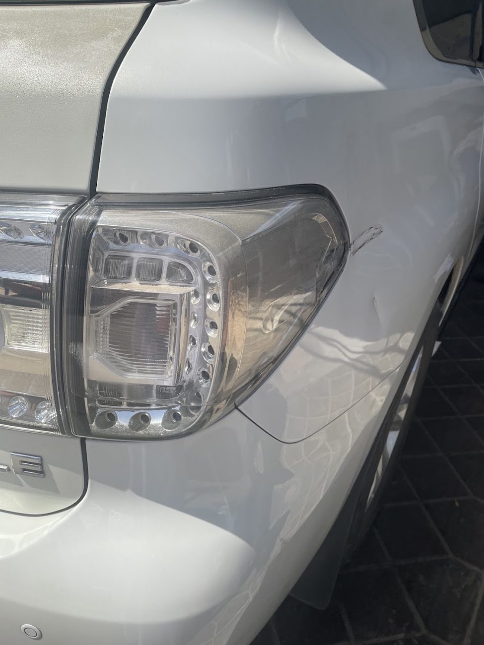 A tail light refitted on a white SUV